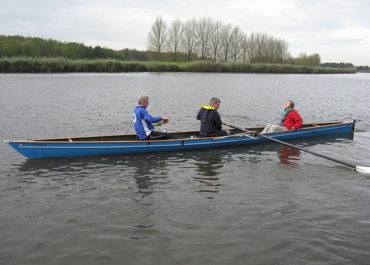 C2+ two with cox, oar rowing