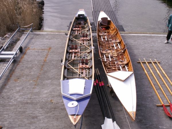 Inrigger rowing boat comparison old and new